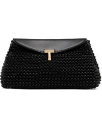 TOTEME - Mini T-Lock Woven-Leather Clutch - Lyst