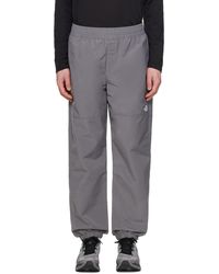 The North Face - Pantalon de survêtement coupe-vent tnfTM gris à taille élastique - Lyst