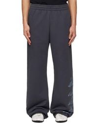 we11done - Multi-Logo Sweatpants - Lyst