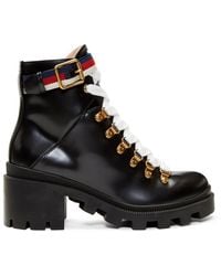 gucci boots with snakes on the bottom