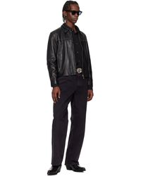 ernest-w-baker-Black-Leather-