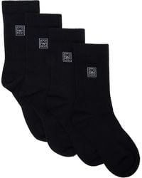 TOTEME - Two-Pack Monogram Socks - Lyst