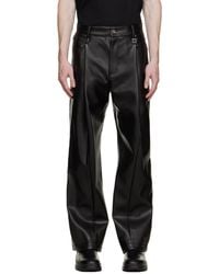 WOOYOUNGMI - Black Pleated Faux-leather Trousers - Lyst