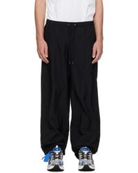 Off-White c/o Virgil Abloh - Glossy Arrow Nylon Relax Track Pants - Lyst