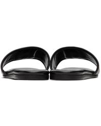Claquettes en caoutchouc à imprimé logo Givenchy en coloris Noir Femme Chaussures plates Chaussures plates Givenchy 26 % de réduction 