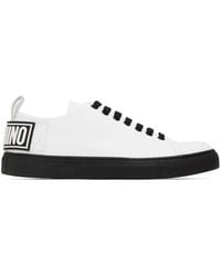 Moschino - Baskets blanches à logo gaufré - Lyst