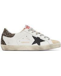 white glitter star snakeskin superstar sneakers