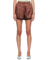 Ganni - Printed Sandwashed Silk Satin Lace Hem Shorts - Lyst