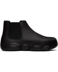 Moschino - Black Rubber Logo Ankle Boots - Lyst