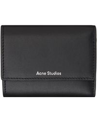 Acne Studios - Portefeuille noir en cuir à trois volets - Lyst
