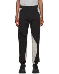 Pantalon de survêtement à panneaux Synthétique HELIOT EMIL pour homme en coloris Noir Homme Vêtements Articles de sport et dentraînement Pantalons de survêtement 
