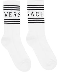 Versace - Chaussettes blanc et noir à logo rétro '90s - Lyst