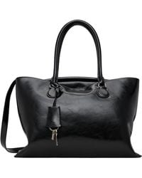 OSOI Slide Brot Bag in Black | Lyst