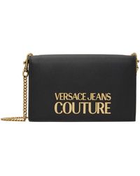 double wastefully Between Versace Jeans Couture Synthetic Logo Buckle Shoulder Bag in Pink | Lyst