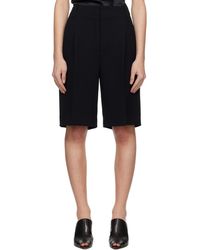 KHAITE - Laden Shorts - Lyst