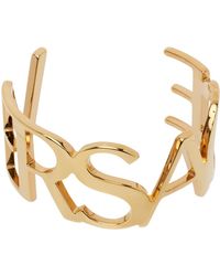 Versace - Bracelet manchette doré à logo - Lyst