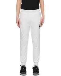 Aape By A Bathing Ape - Pantalon de survêtement blanc cassé à logos brodés - Lyst