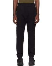 C.P. Company - Pantalon de survêtement noir à poches cargo - metropolis series - Lyst