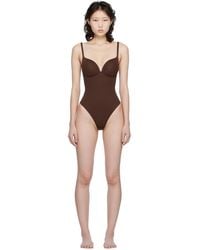 Skims - Ultimate Body Push-Up Thong Bodysuit - Lyst