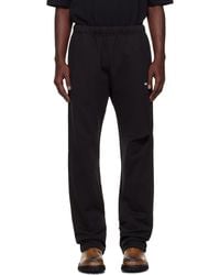 we11done - Logo Wide Jogger Sweatpants - Lyst