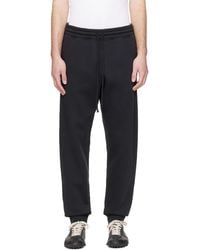Skims - Fleece Lounge Tapered Jogger Sweatpants - Lyst
