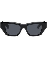Alaïa - Alaïa lunettes de soleil rectangulaires noires - Lyst