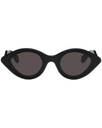 Alaïa - Alaïa lunettes de soleil ovales noires - Lyst
