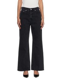 DUNST - Relaxed Flared Jeans - Lyst
