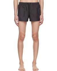 Versace - Maillot de bain noir à logo et cartouche - Lyst