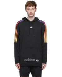 adidas originals hoodie with shoulder 3 stripes green