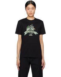 Givenchy - T-shirt noir à logos contrecollés - Lyst