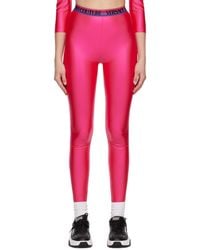 Versace - Pink Shiny leggings - Lyst