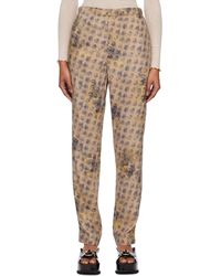 Acne Studios - Beige Floral Trousers - Lyst