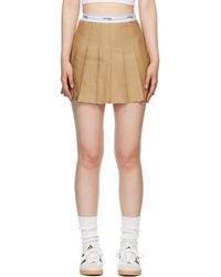 HOMMEGIRLS - Tan Pleated Miniskirt - Lyst