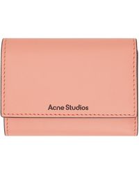 Acne Studios - Portefeuille rose en cuir à trois volets - Lyst