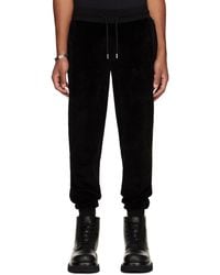 BOSS - Pantalon de survêtement noir à logo brodé - Lyst