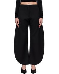 Alaïa - Petal Wool Trousers - Lyst
