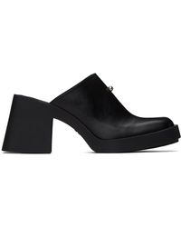 Justine Clenquet - Mules raya noires - Lyst