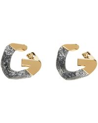 Givenchy - Boucles d'oreilles g chain bicolores dorées - Lyst