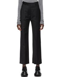 Femme Vêtements Pantalons décontractés Pantalon en crepe Synthétique Totême en coloris Noir élégants et chinos Pantalons coupe droite 