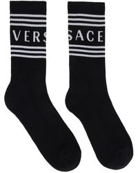 Versace - Chaussettes noir et blanc à logo rétro '90s - Lyst