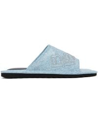 BY FAR - Blue Ari Stud Slides - Lyst