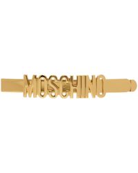Moschino - Barrette dorée à logo - Lyst