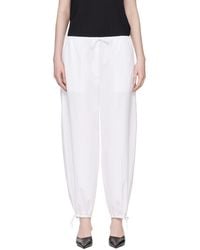 TOTEME - Drawstring Cotton Trousers - Lyst