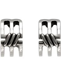 Balenciaga - Boucles d'oreilles à anneau argentées à logo - Lyst