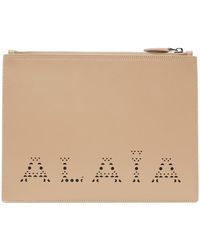 Alaïa - Alaïa Tan Large Logo Pouch - Lyst