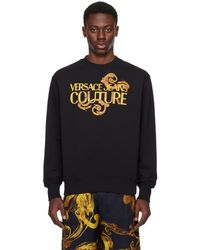 Versace - Pull molletonné noir à logo à motif watercolor couture - Lyst
