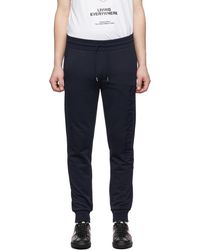 Moncler - Pantalon de survêtement bleu marine à logo - Lyst
