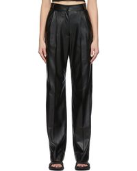 Pantalon a taille haute en cuir synthetique ‎Materiel Tbilisi‎ en coloris Noir élégants et chinos Sarouels Femme Vêtements Pantalons décontractés 