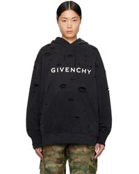 Givenchy - Pull à capuche noir à découpes - Lyst